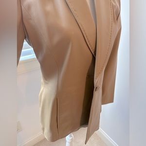Camel colored leather jacket, size Medium.